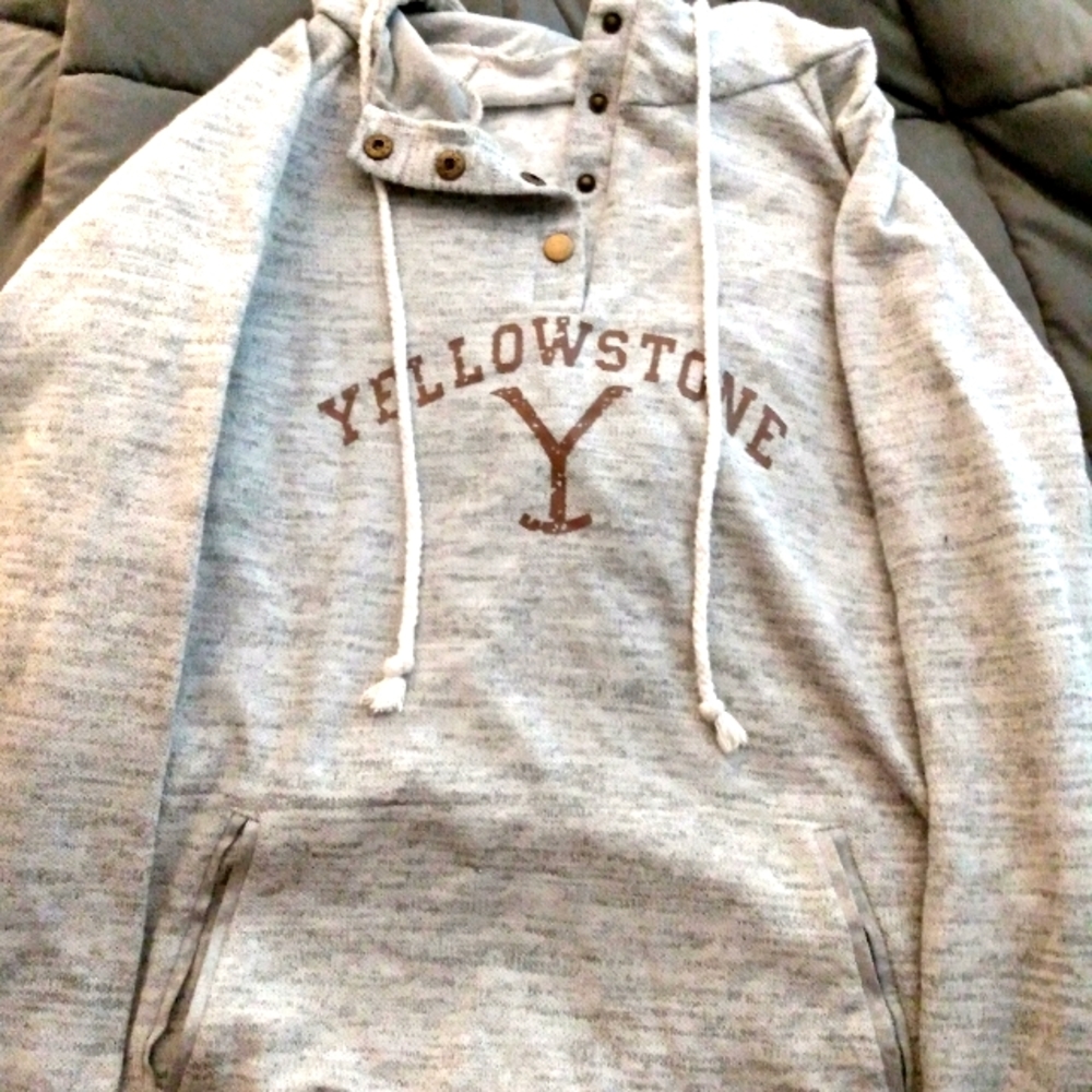 A woman's size Large Yellowstone sweatshirt with a pretty spacious pocket